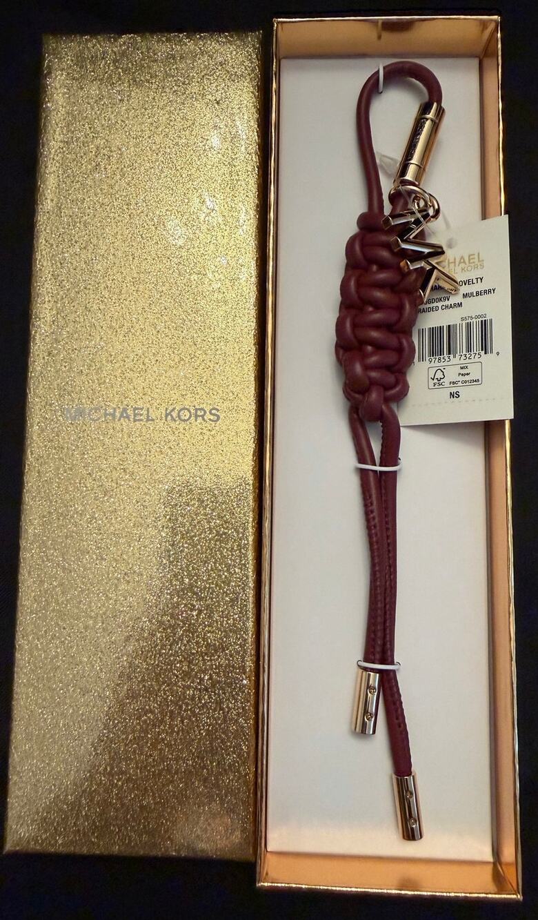 NWT Michael Kors leather braided bag charm features a knotted maroon cord 9”